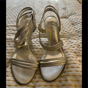 Ralph Lauren gold strapped bread shoes.